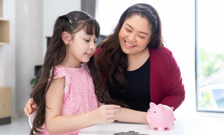 smiling-happy-daughter-child-collect-coin-money-saving-education-economic-piggy-bank